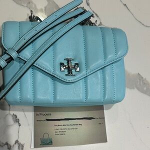 Tory Burch Mini Kira Top Handle Bag (paid $398). See receipt . Baby blue